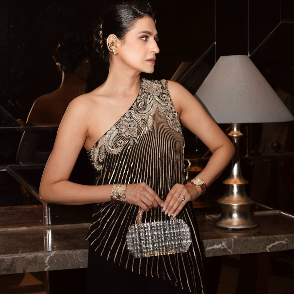 Amrita Mehra Styles L'afshar bag at Lakme Fashion Week